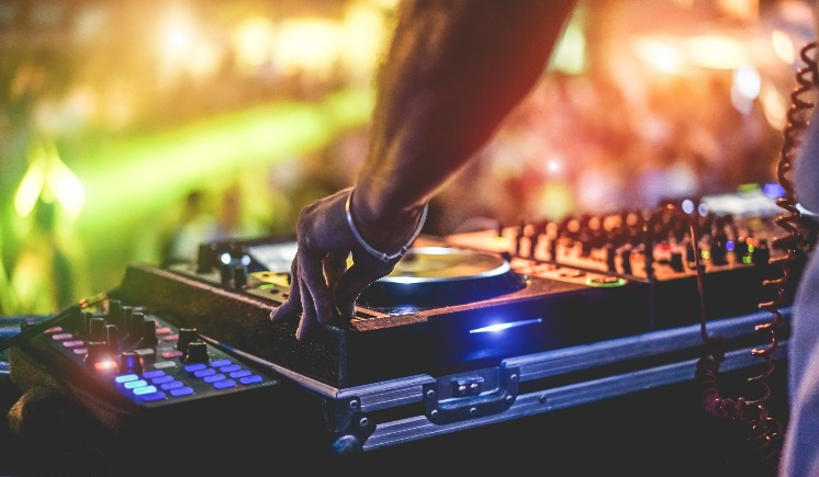 DJ mixing in nightclub